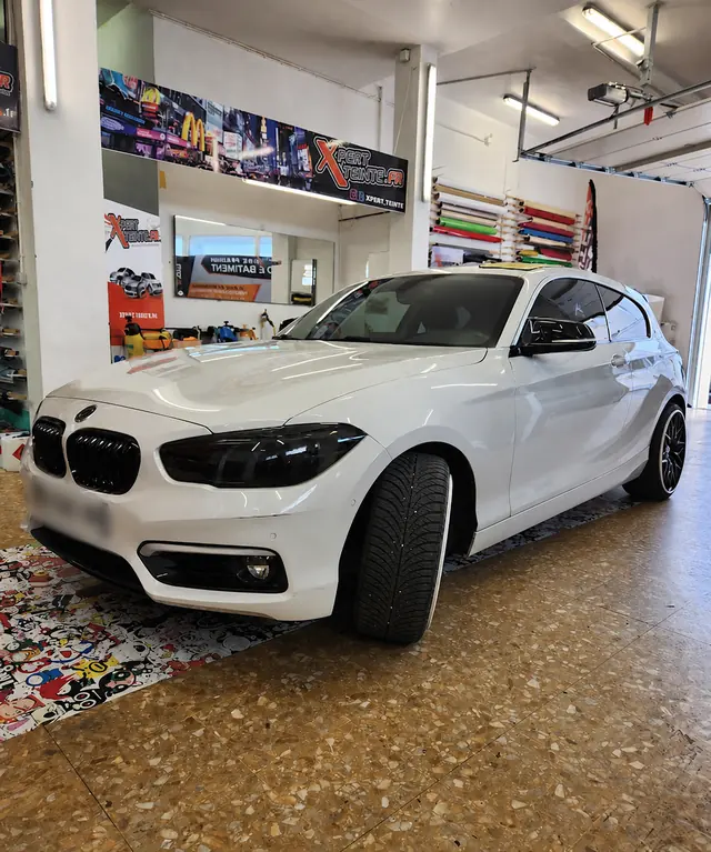 BMW Série 1 avec vitres teintées dans l’atelier Xpert Teinte Toulon